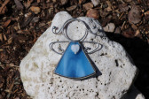 little angel with a blue heart  - historical glass