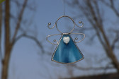 little angel with a blue heart  - historical glass