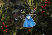 little angel with a blue heart  - historical glass